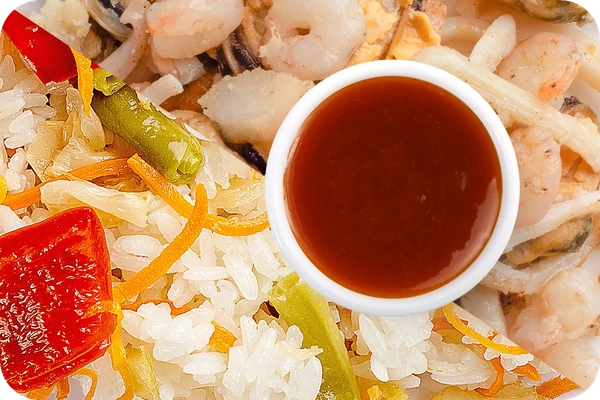 Заказать "Рис (овощи) + Морепродукты + Остро-сладкий соус" с доставкой в Нагаево от ресторана Farfor Рис (овощи) + Морепродукты + Остро-сладкий соус